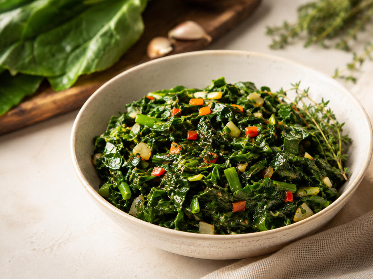 Bowl of callaloo greens with peppers